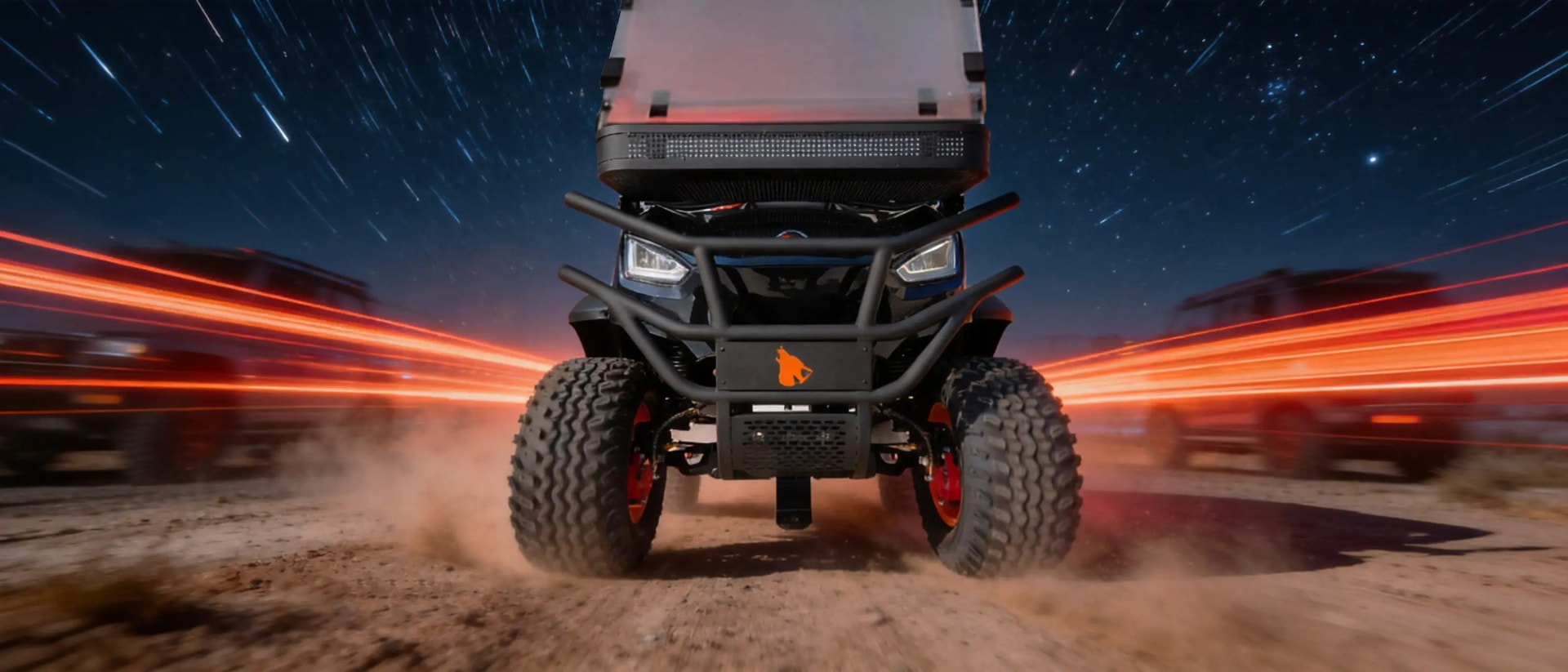 Wolverine cart driving on open terrain